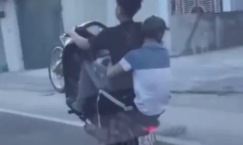 Xử lý nam thanh niên chở bạn không đội mũ bảo hiểm bốc đầu trên QL1A