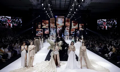 Hoa hậu Đỗ Mỹ Linh diện váy 40kg làm vedette trong BST của NTK Đỗ Long